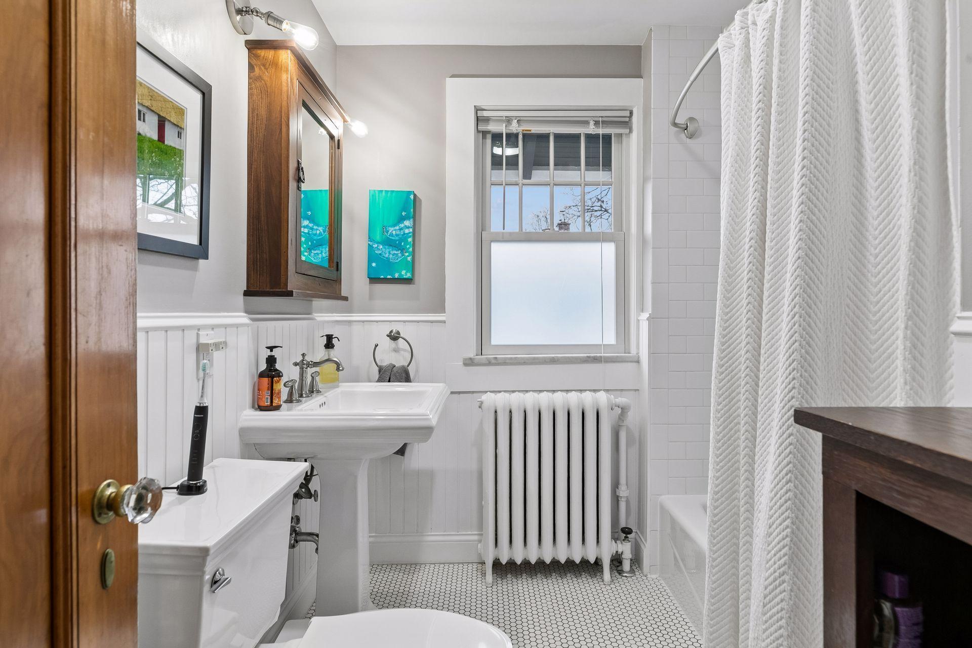 Sparkling clean and updated tastefully second floor bath - really matches the house