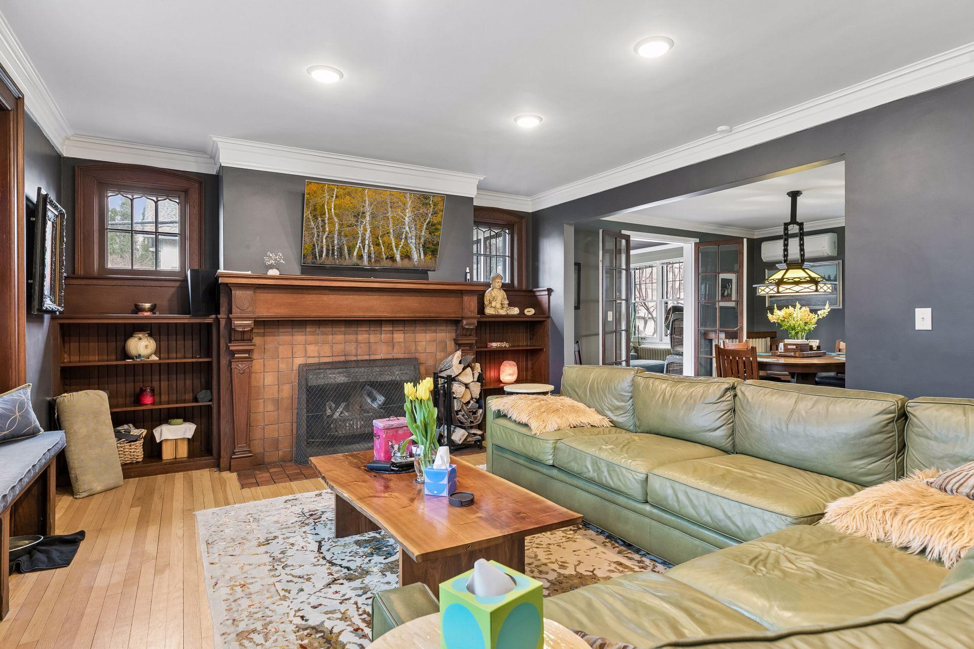 Living has overhead lighting in the ceiling - built in bench - living room window have security film on them for privacy - all the woodwork has been revarnished and restained