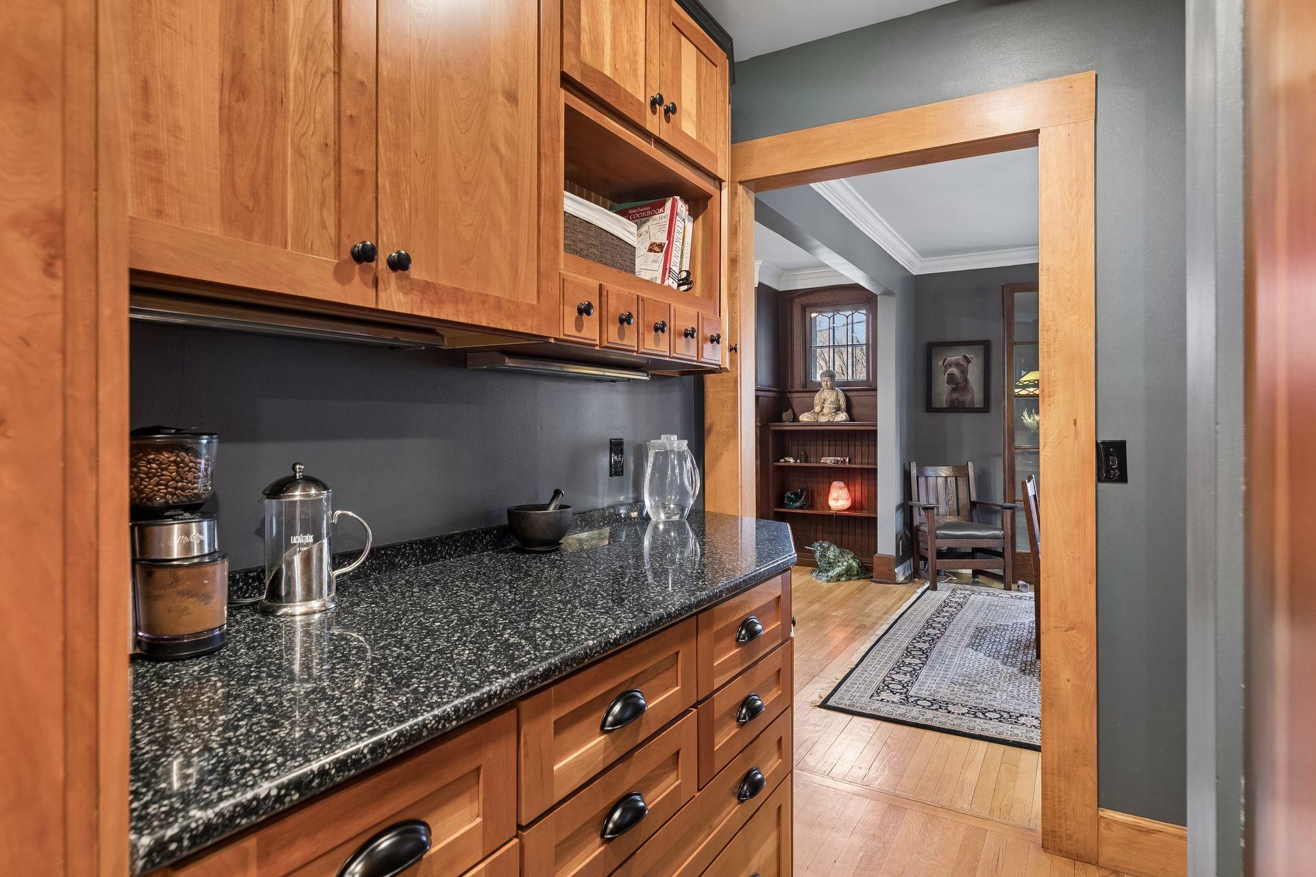 Coffee bar area between kitchen and dining room - half bath to the right before the dining room