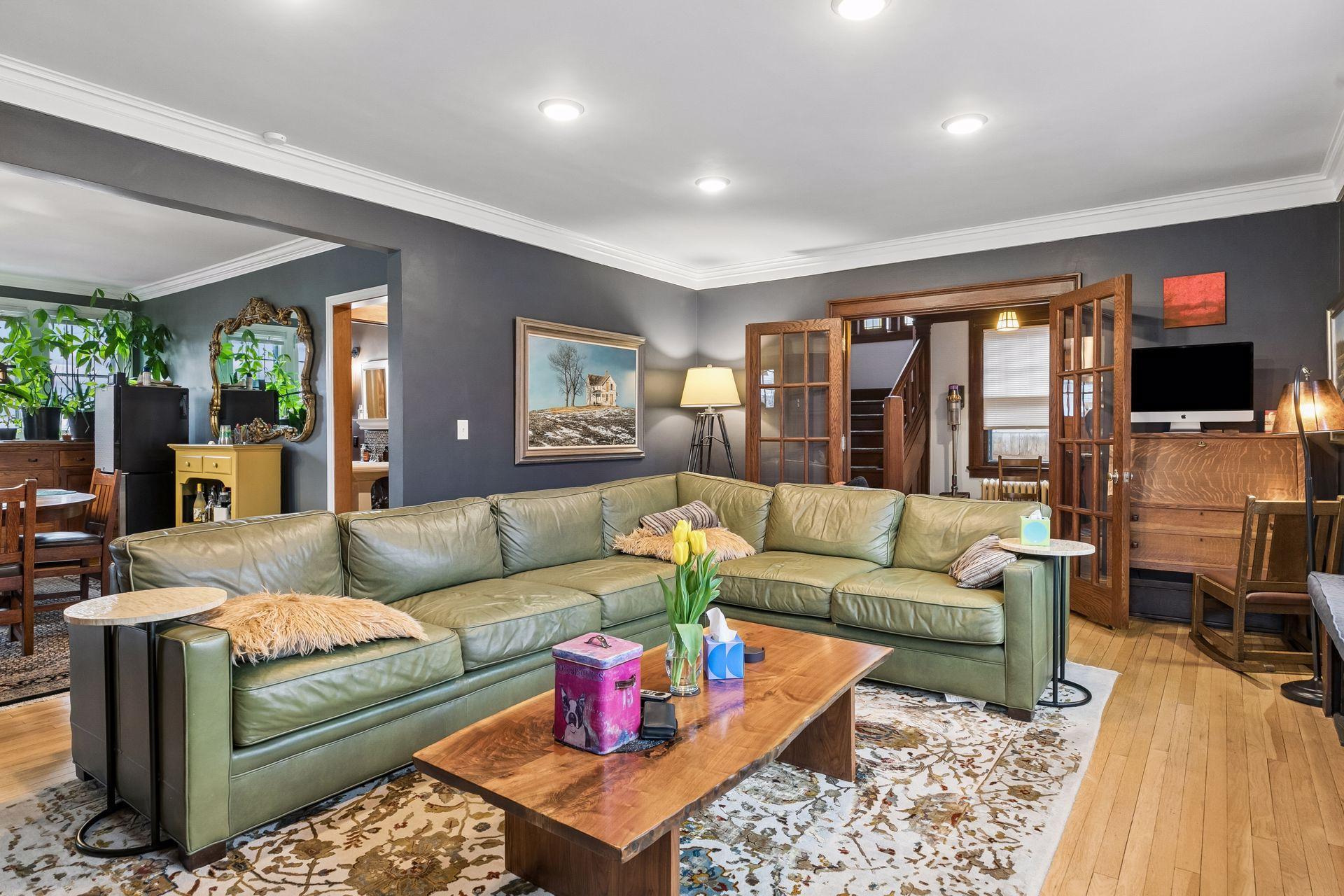 Original French doors to foyer and dining room to the left