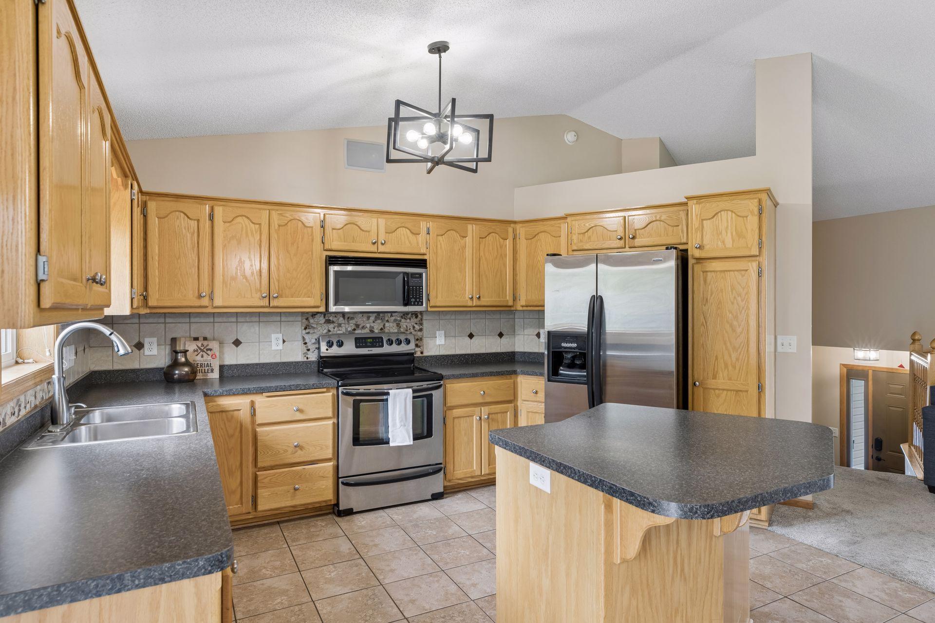 Kitchen featuring stainless steel appliances and an open layout that flows effortlessly into the main living spaces.