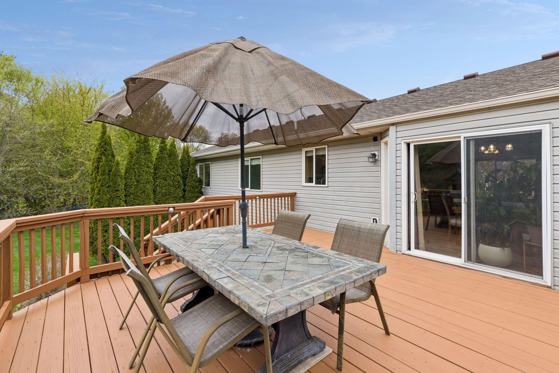 Seamless indoor-outdoor living with direct access from the dining area to the spacious deck, offering plenty of room for grilling, entertaining, and relaxing outdoors.