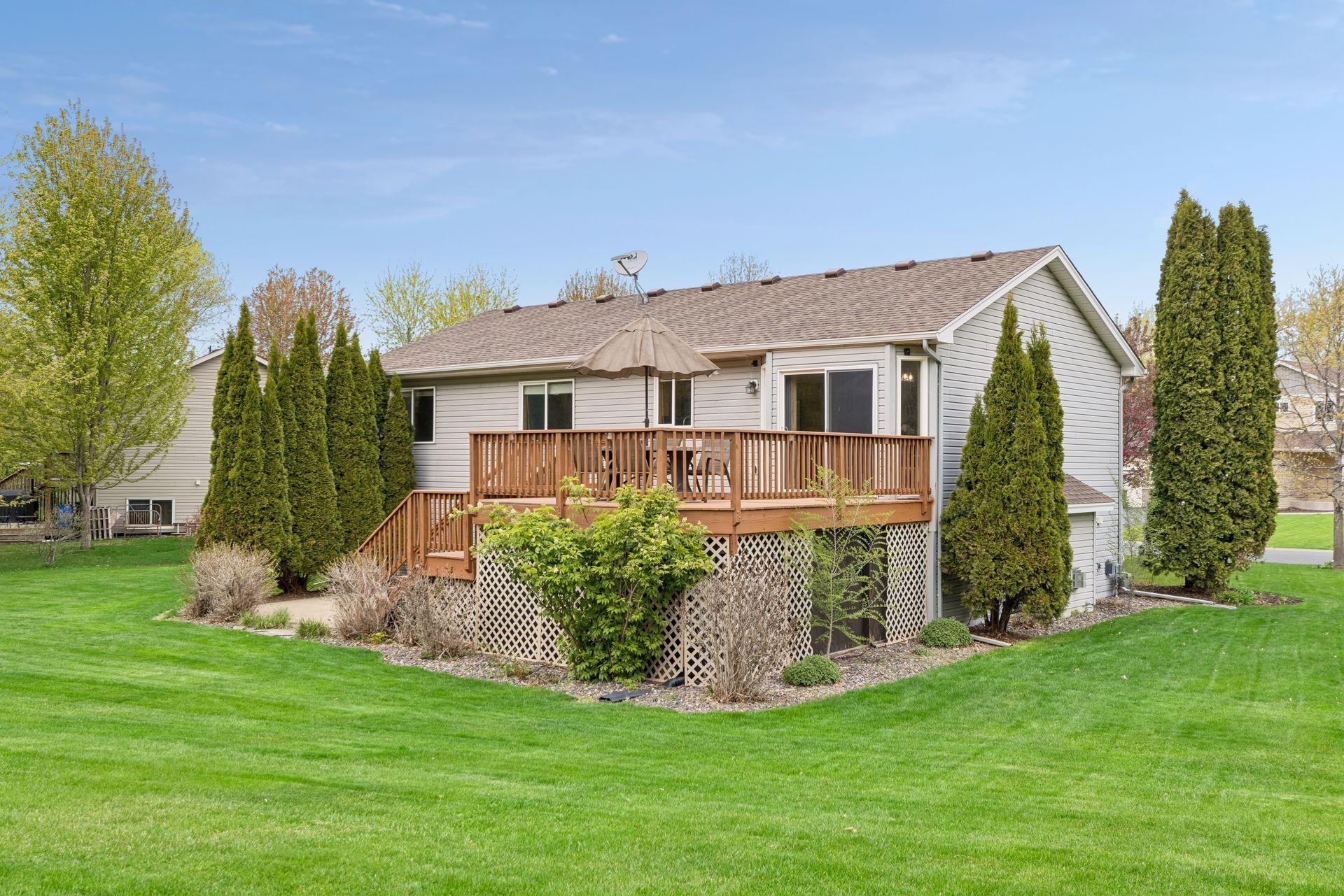 Enjoy peaceful backyard views, mature landscaping, and the perfect setting for relaxing or entertaining on the expansive deck and patio.