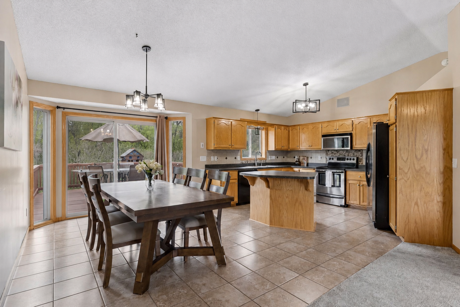 Vaulted ceilings, abundant natural light, and an open-concept layout create the perfect space for everyday living.