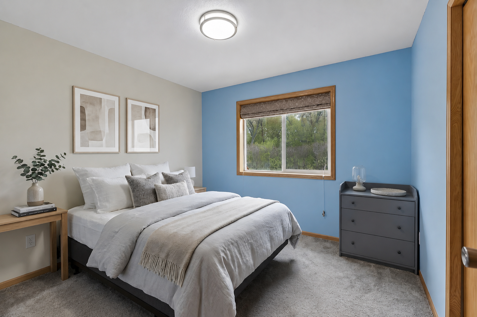 The second bedroom overlooking the peaceful backyard *Virtually staged to show design options.