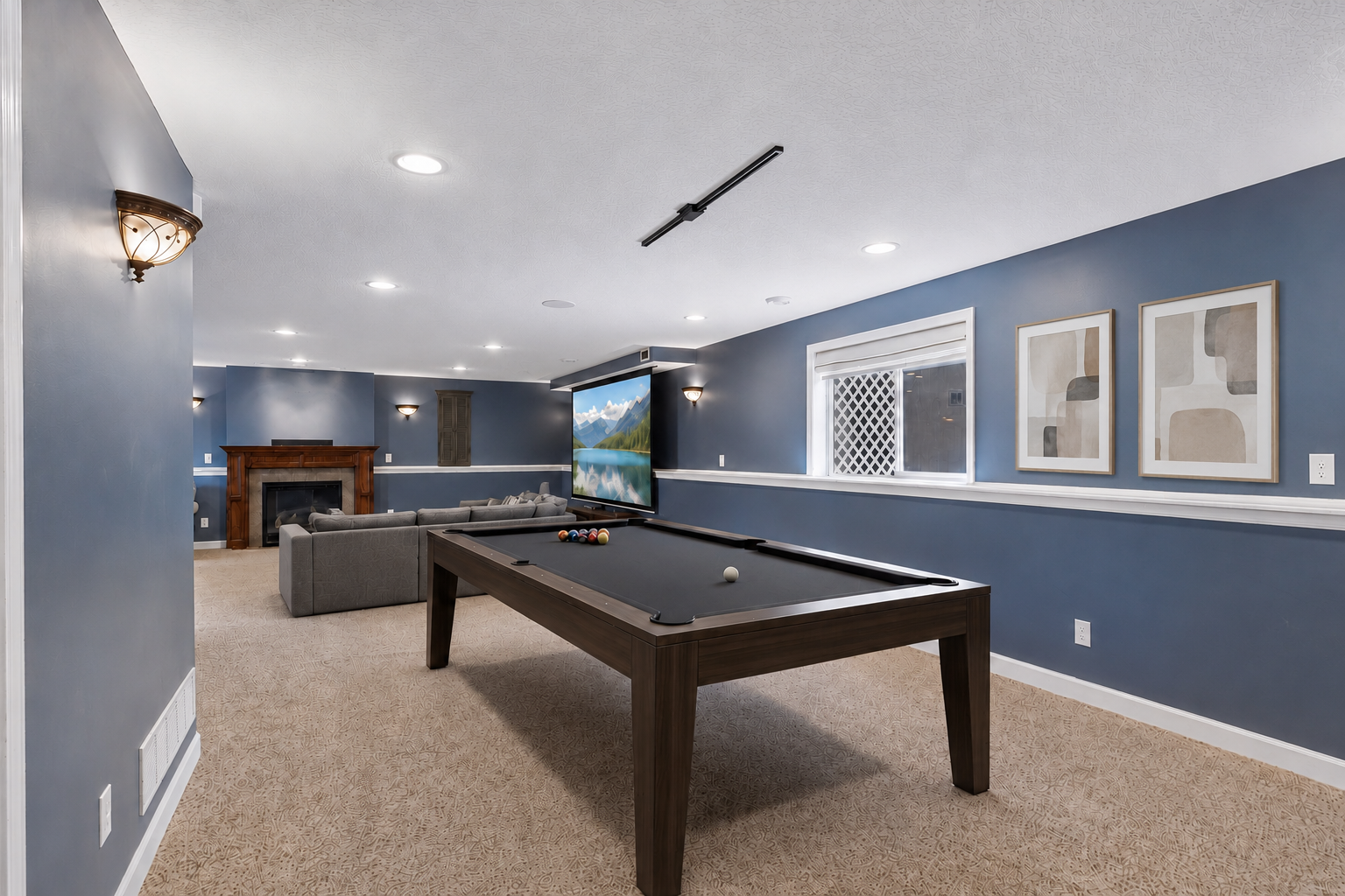 See the potential of this incredible lower-level entertainment space- virtually staged to showcase how easily the expansive family room can accommodate a pool table, gaming area. *Virtually staged to show design options.