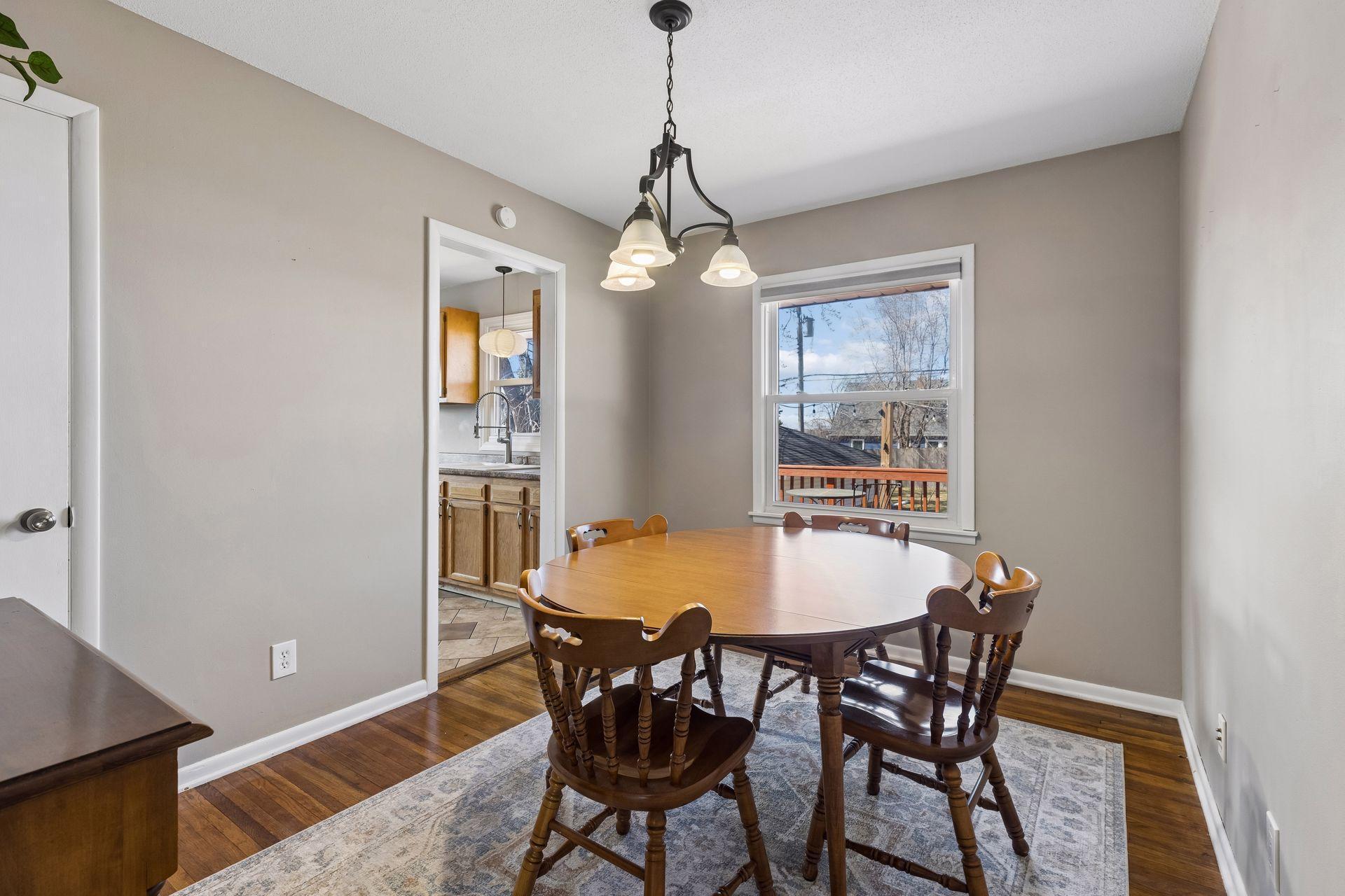 Dining room with hardwood floors, great natural light, and convenient access to the kitchen.