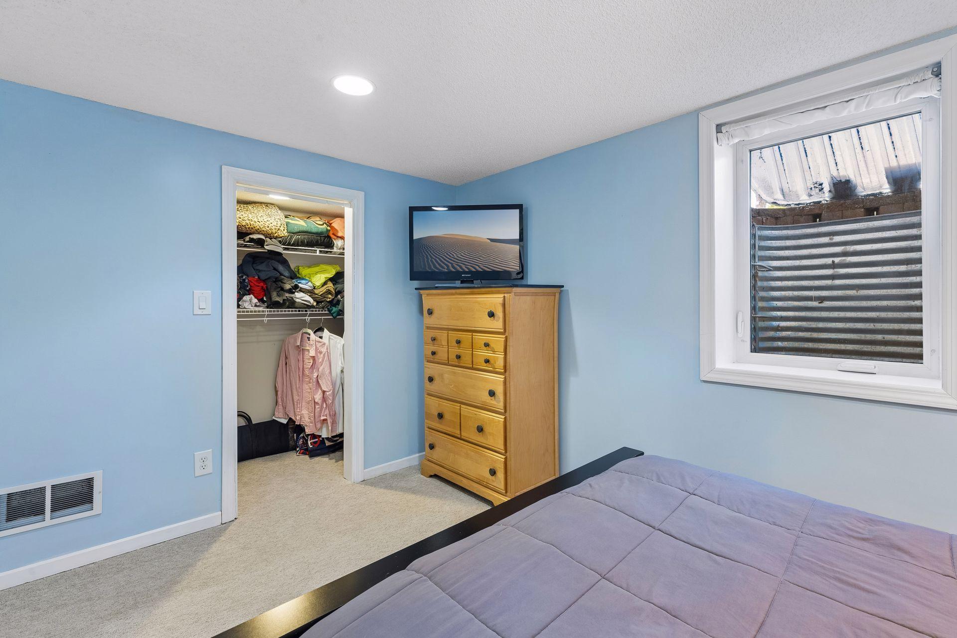 Lower level bedroom also features large walk in closet.
