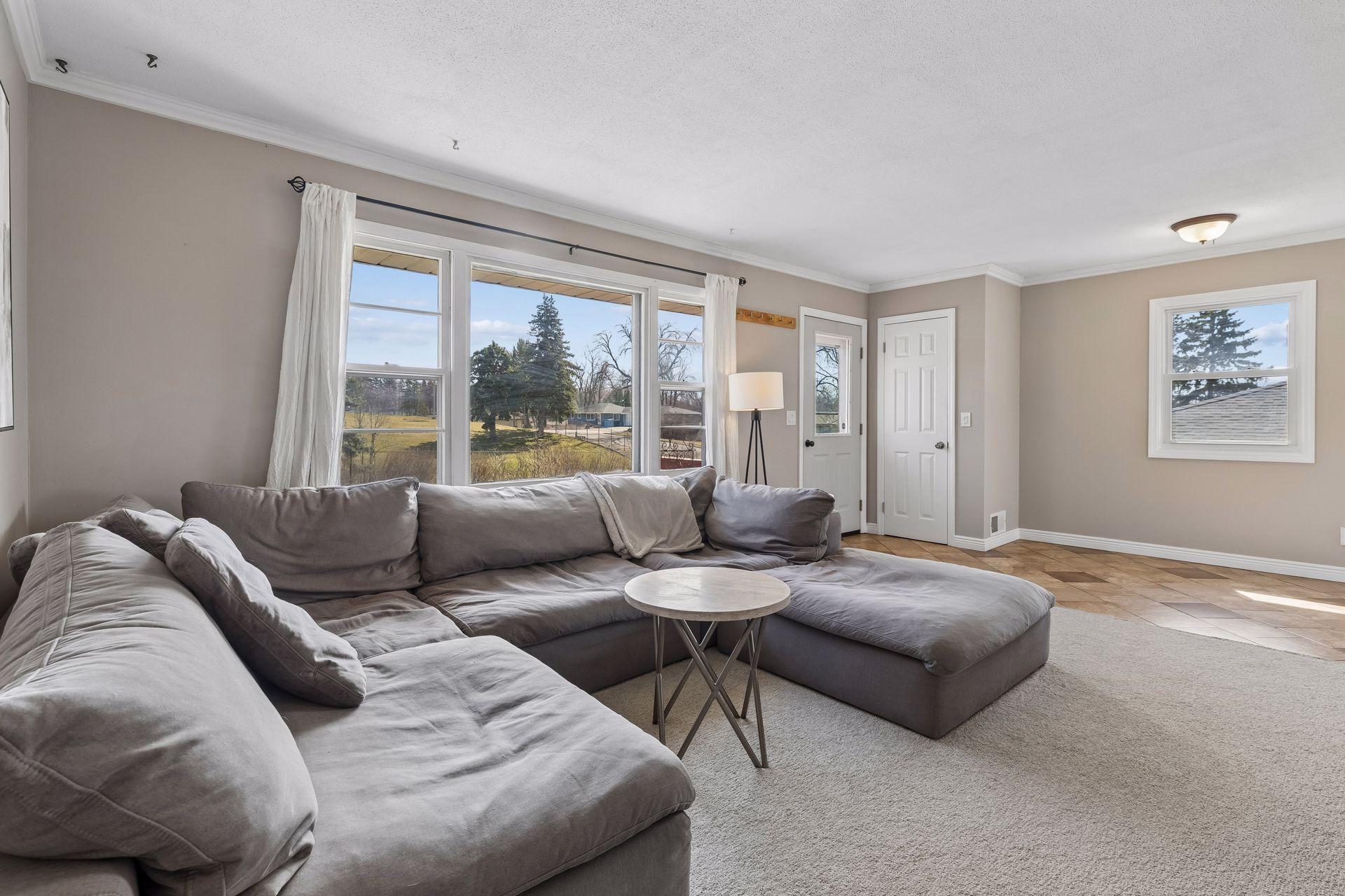 Welcoming entry area with room for a bench or drop zone, plus flexible space for a casual dining nook or additional seating.