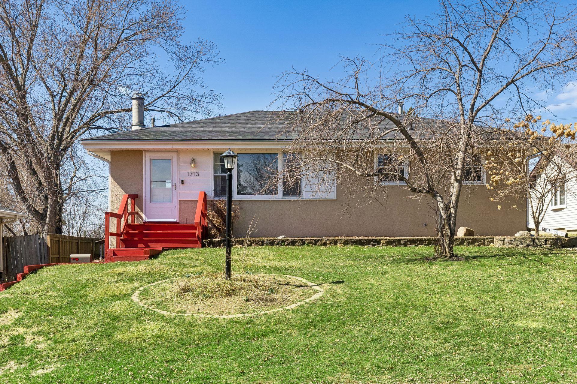 Inviting front entrance overlooking large front yard.