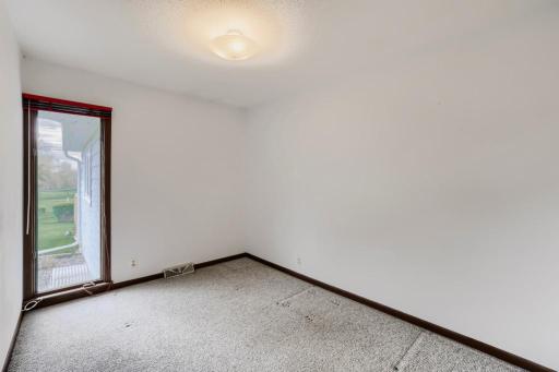 Bedroom3/office empty. Hardwood flooring under the carpet