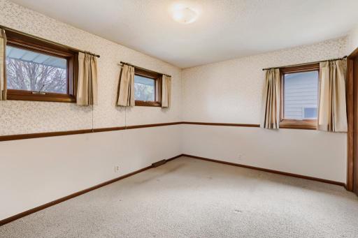 Bedroom 1 empty Hardwood flooring under carpet