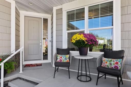 A lovely front porch and spacious foyer to greet your guests
