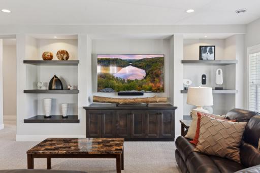 Built in shelving and room for an oversized mounted TV