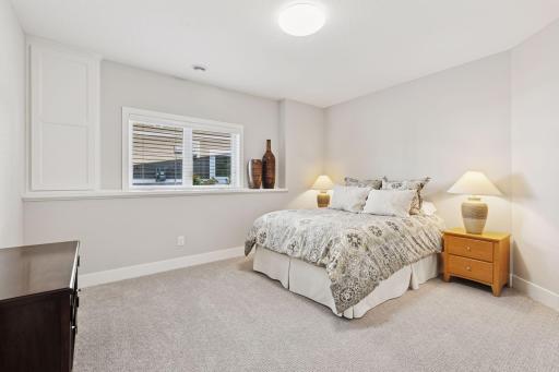 Two additional bedrooms are located in the lower level