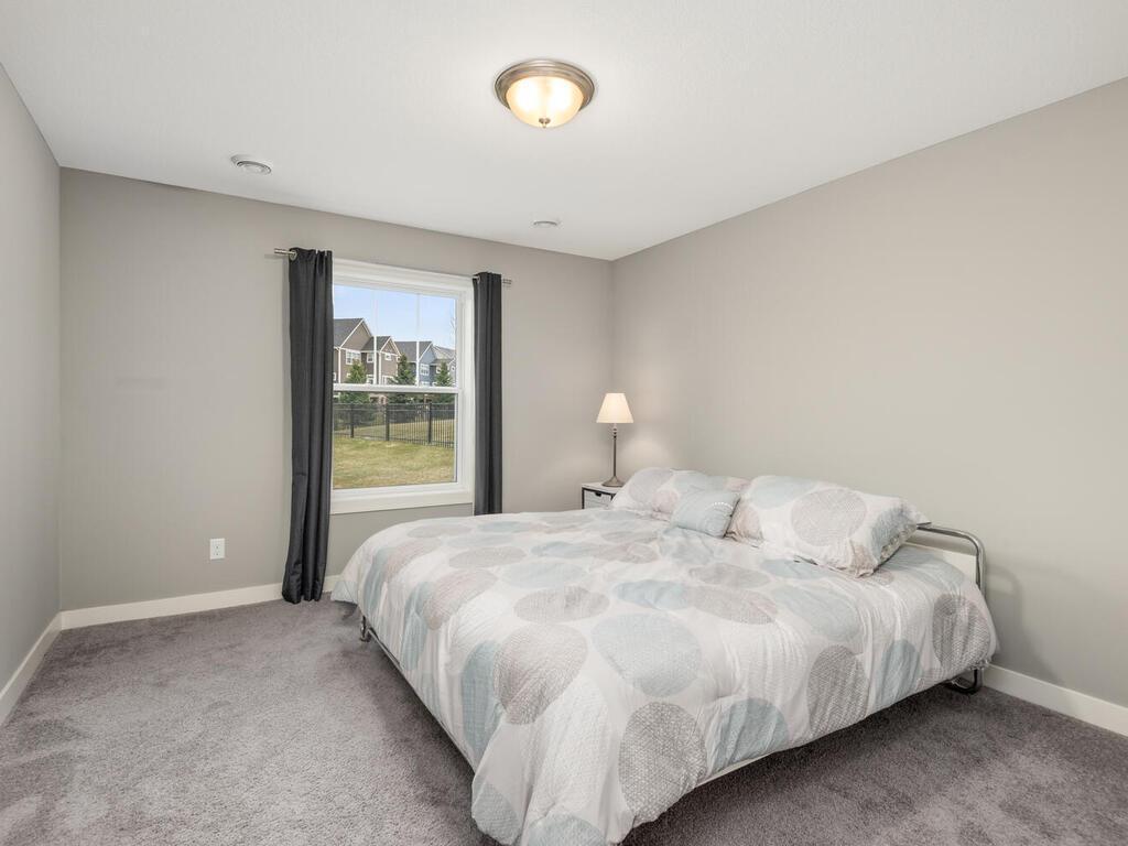 Second lower level bedroom is well-sized with great natural light.