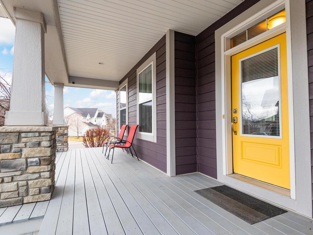 Covered front porch with plenty of space for relaxing outdoors.