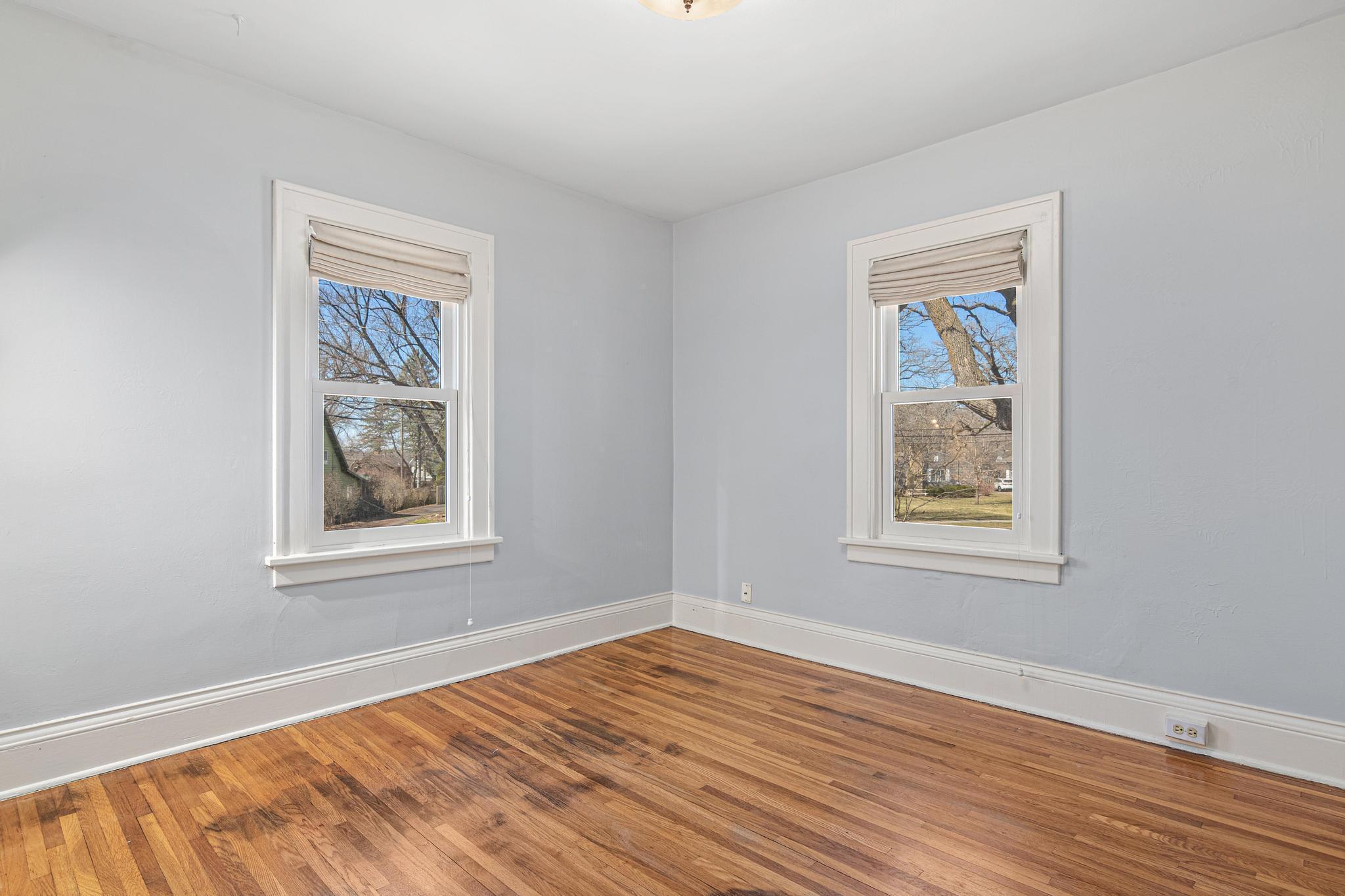 Second bedroom perfect for guests, office, or flex space.