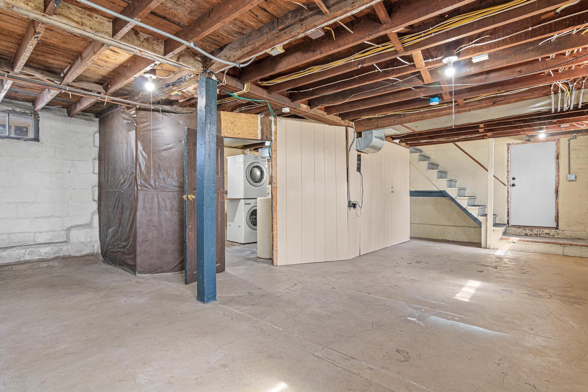 Convenient laundry room with abundant storage space.