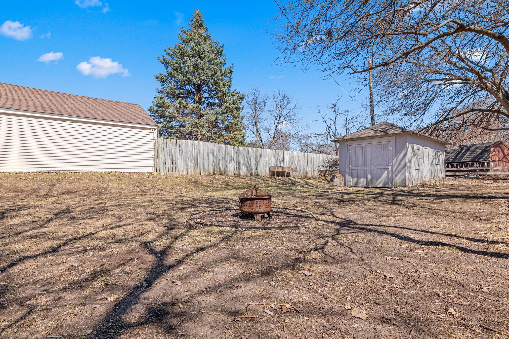 Spacious yard perfect for furry friends or gathering family and friends for football, a bag tournament and more.