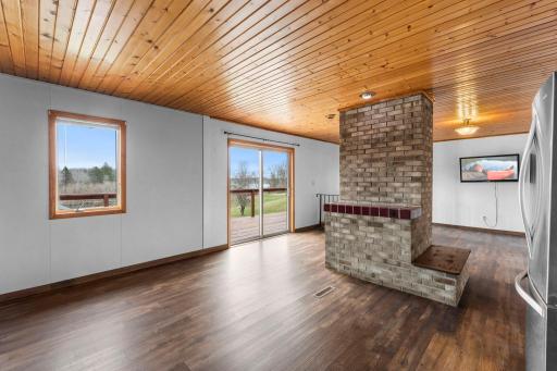 Upper level with sliding doors out to the deck to enjoy lake views