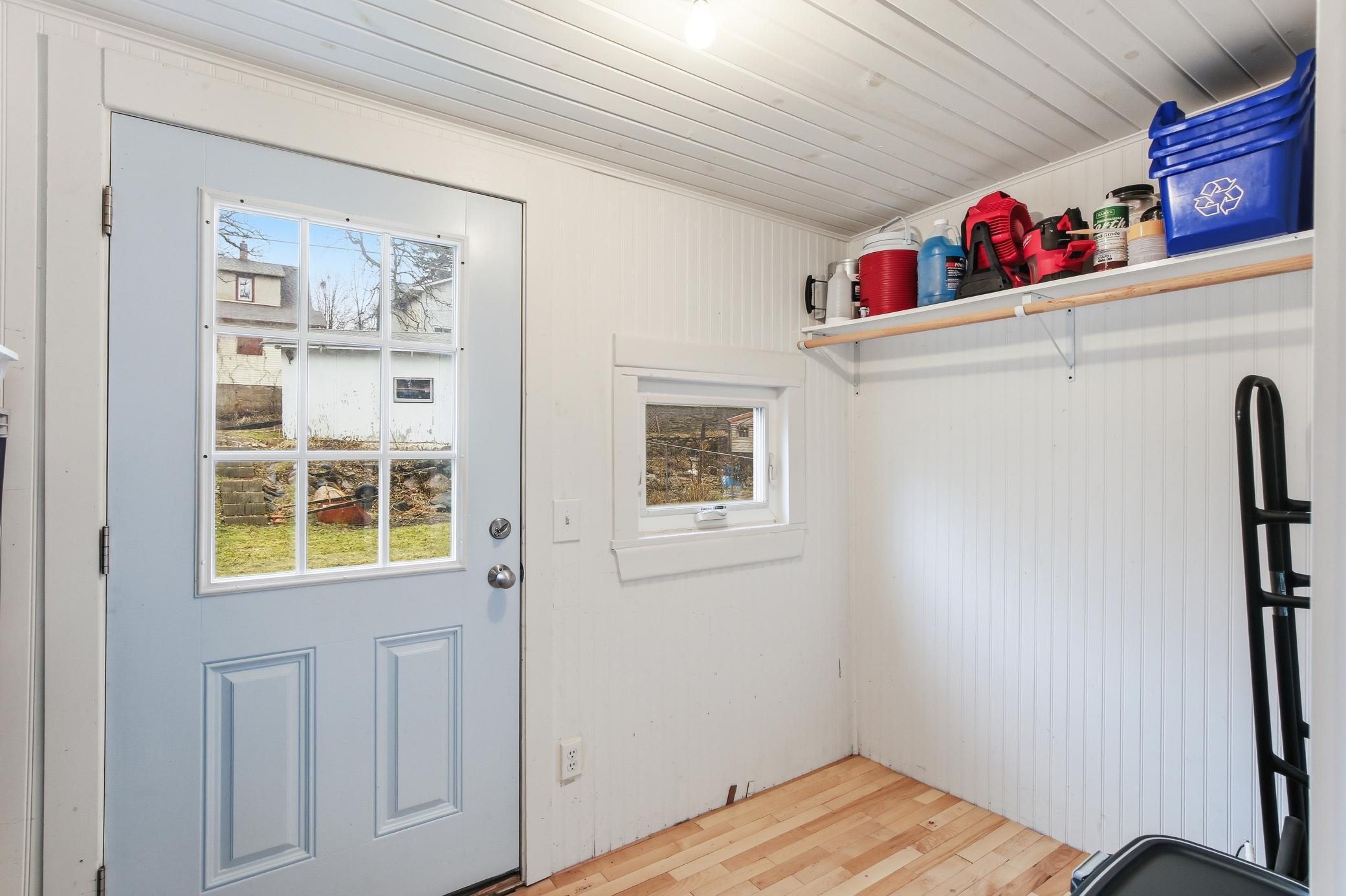 Mud room for the back door is a great place for shoes and storage