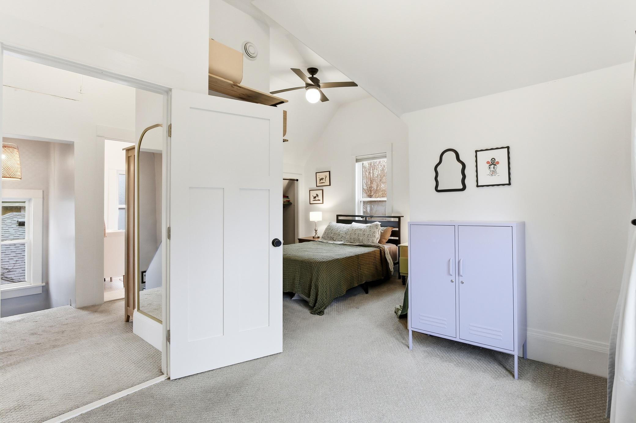 Primary bedroom features two large closets and a really convenient dressing area!