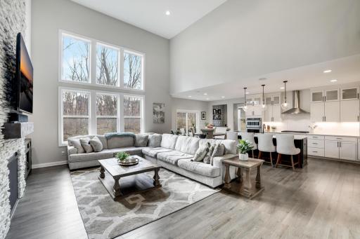The kitchen overlooks the living and informal dining area making it easy for the host to enjoy their guests while entertaining