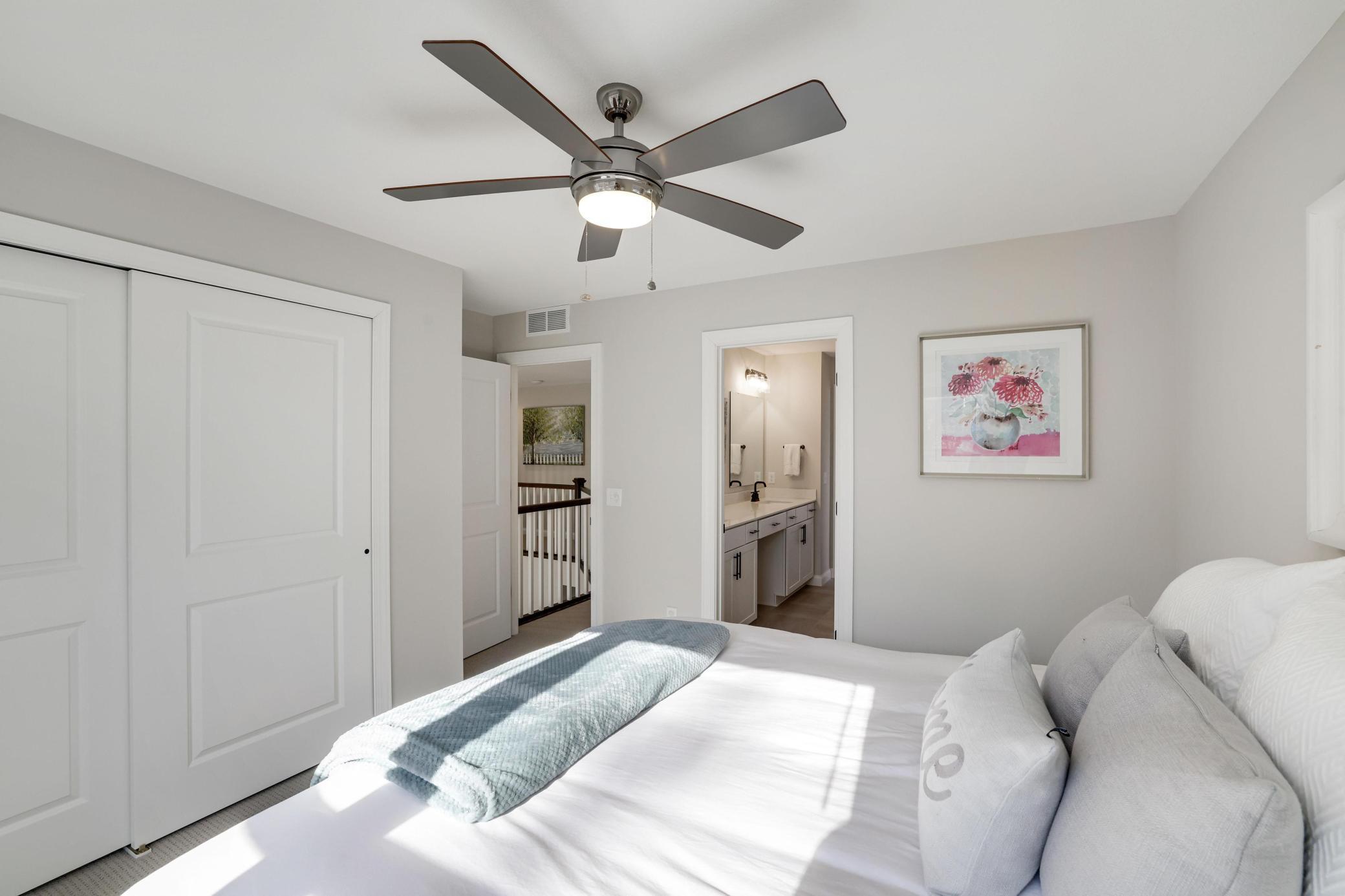 Upper level back bedroom with shared bath