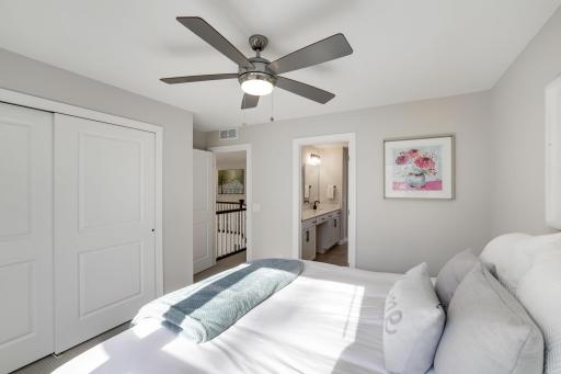 Upper level back bedroom with shared bath