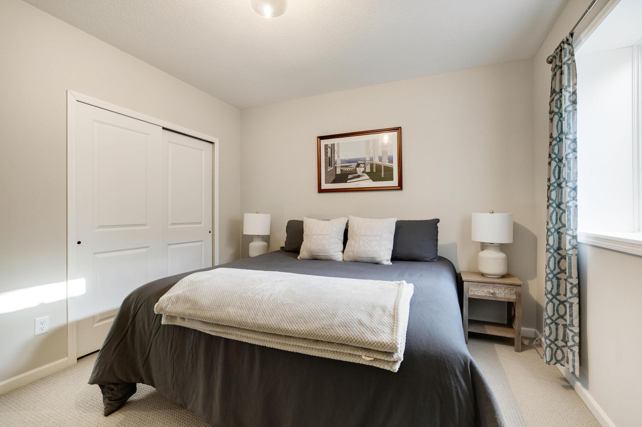 Lower level bedroom with full bath right outside the door