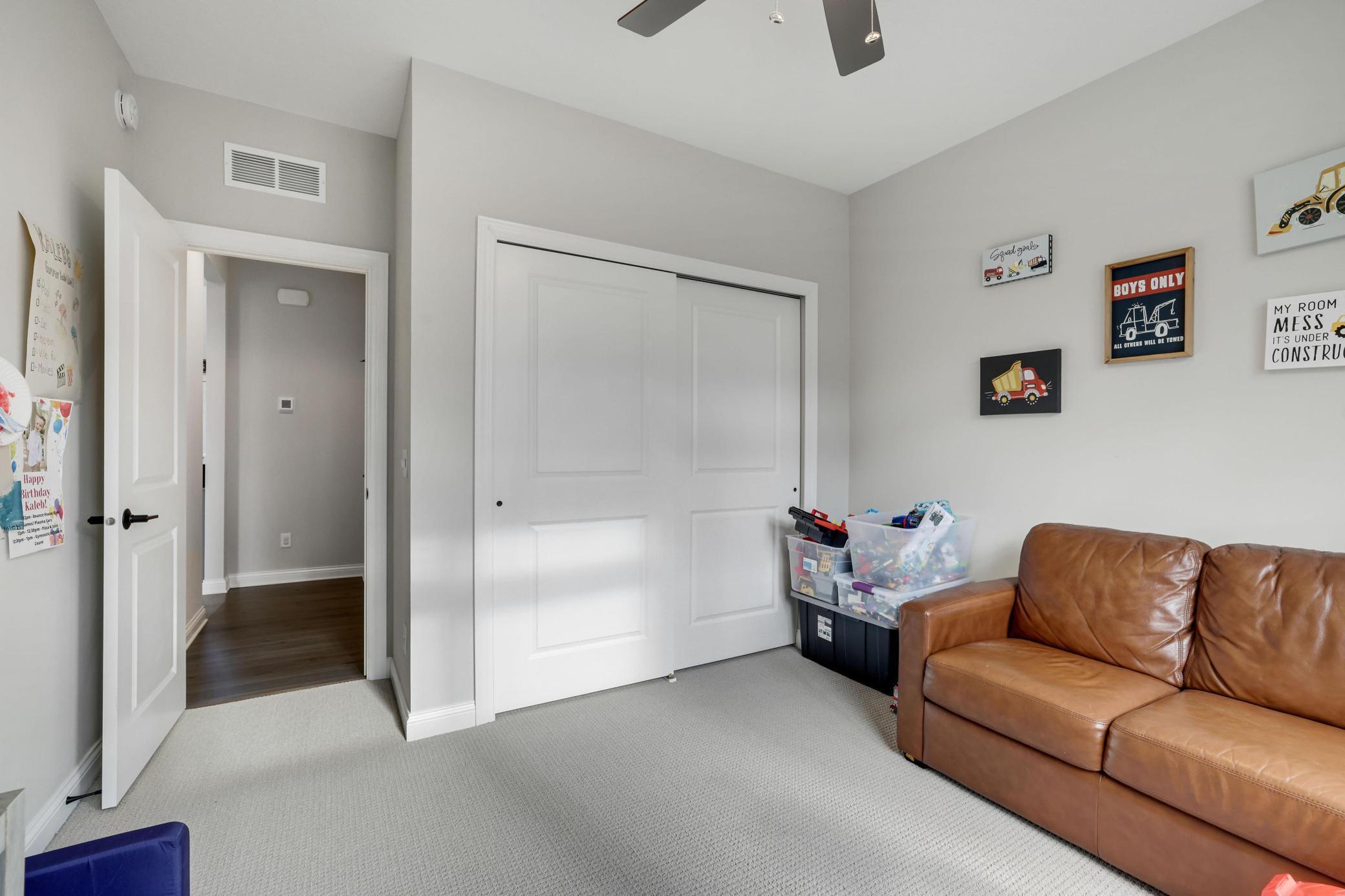 Main floor bath is currently being used as a play room/den