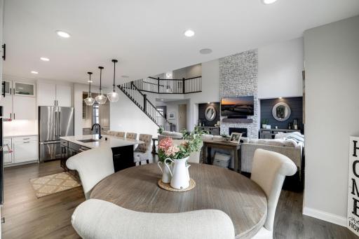 Informal dining has a sliding door that opens to the deck