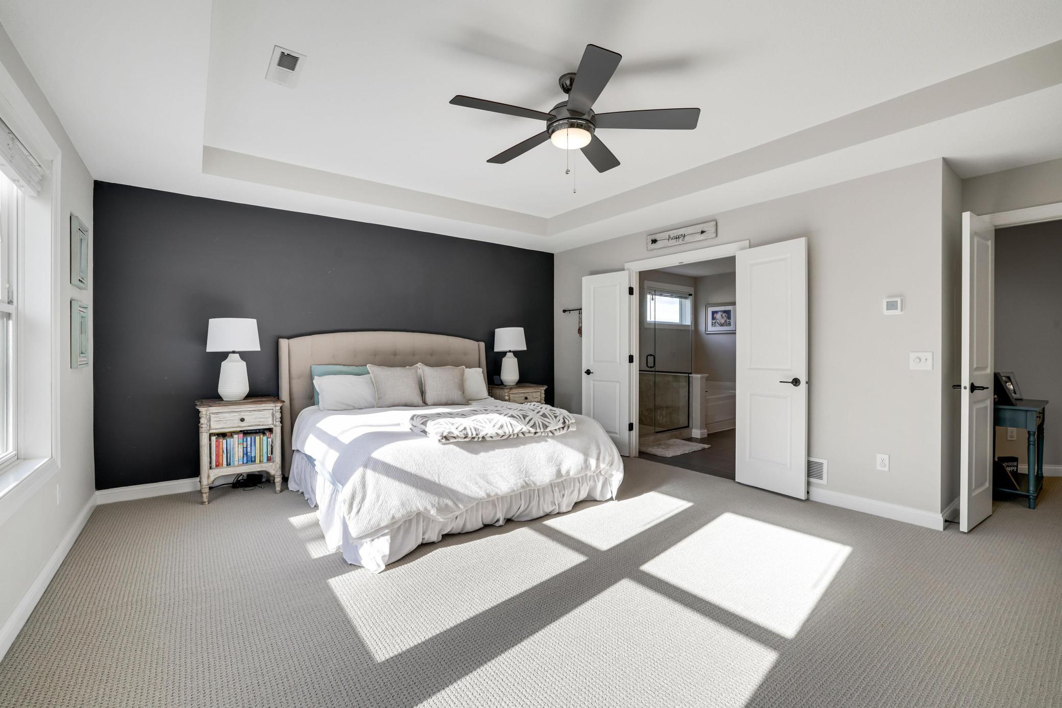 French doors open to the primary bath