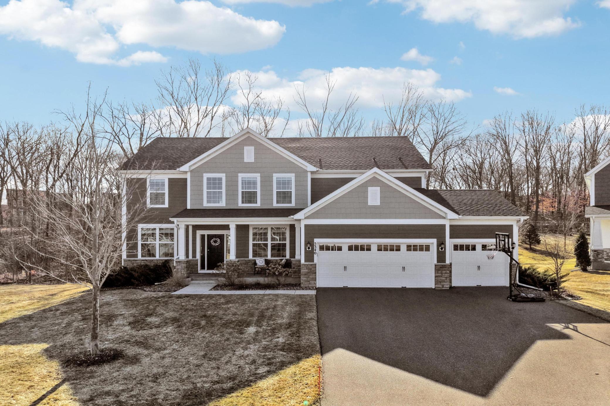 Impressive curb appeal nestled into private cu-de-sac lot