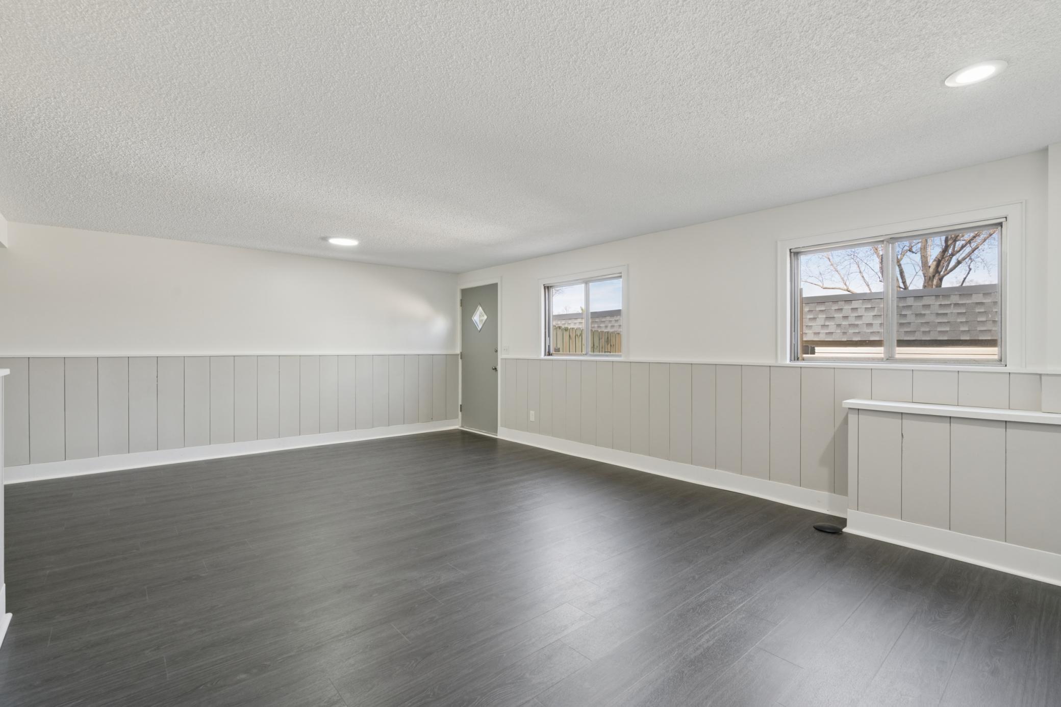 Family Room with Beautiful Wainscoting