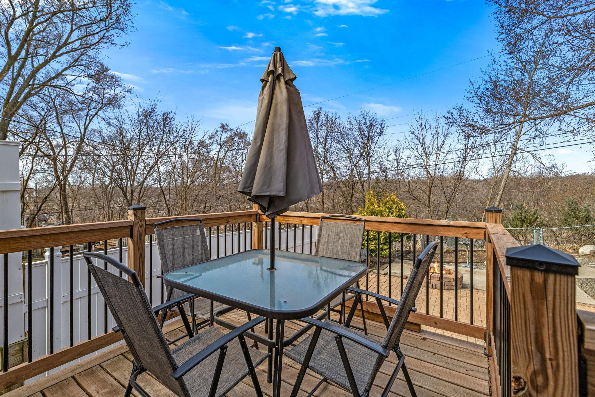 Host on the deck or beautiful paved yard