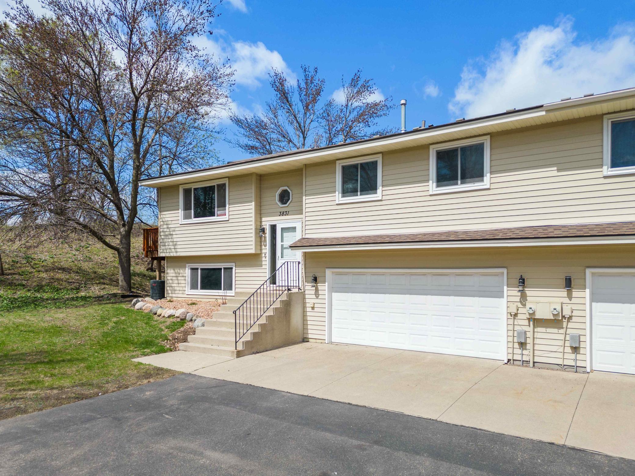 All new windows and patio door. Two car attached garage and extra driveway parking