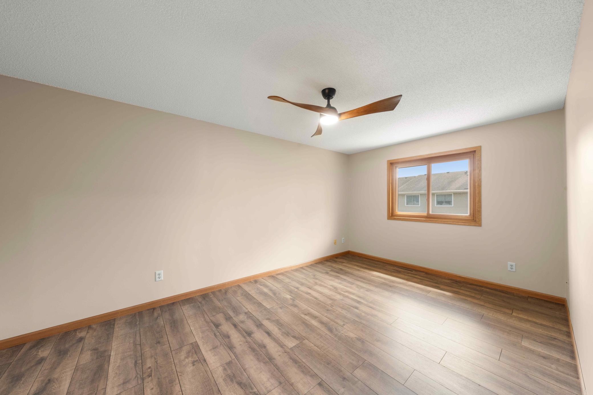 Huge owner's suite with LVP flooring and new light fixture/fan