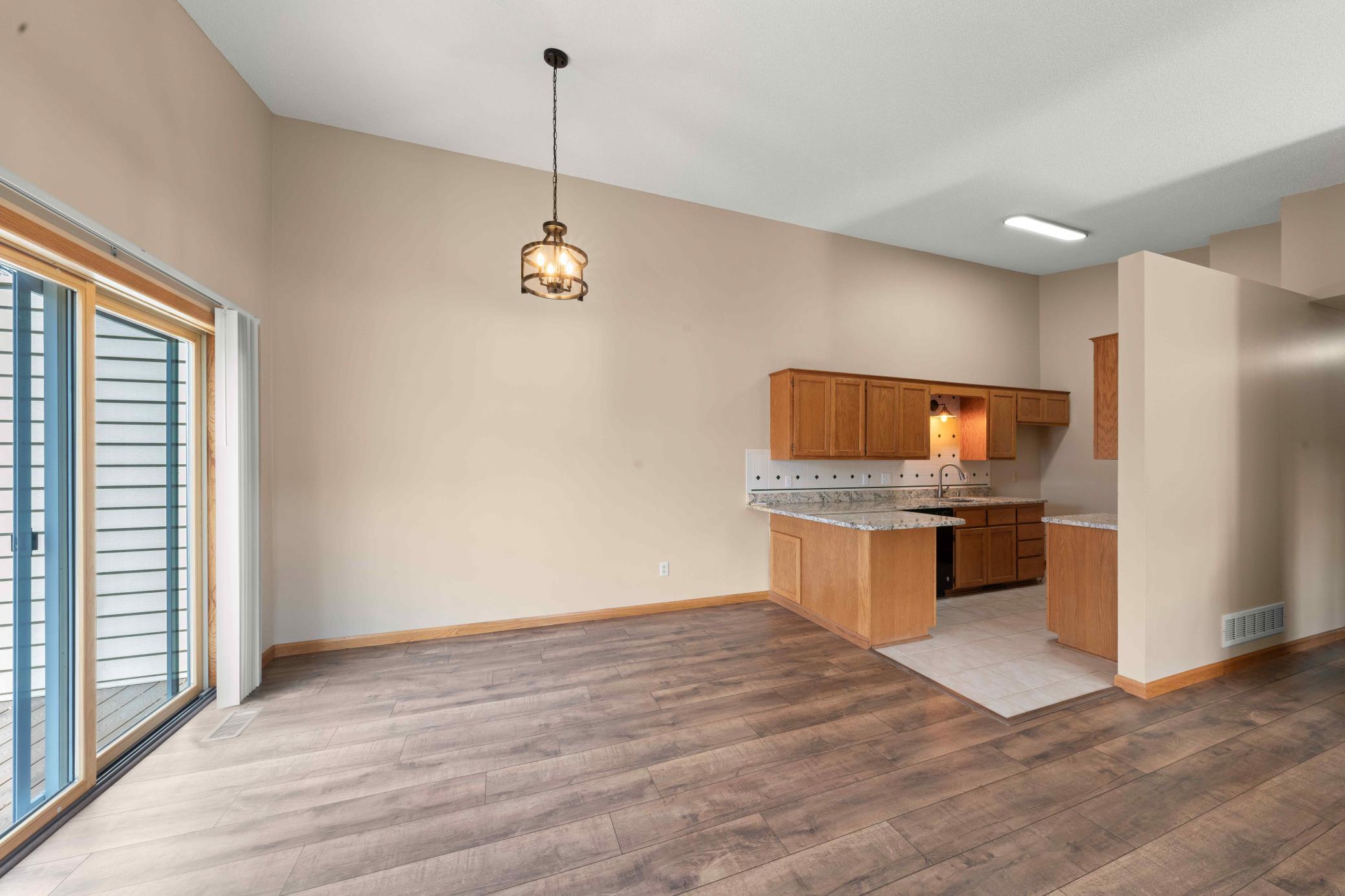 Dining area open to deck and kitchen, great for hosting gatherings and family