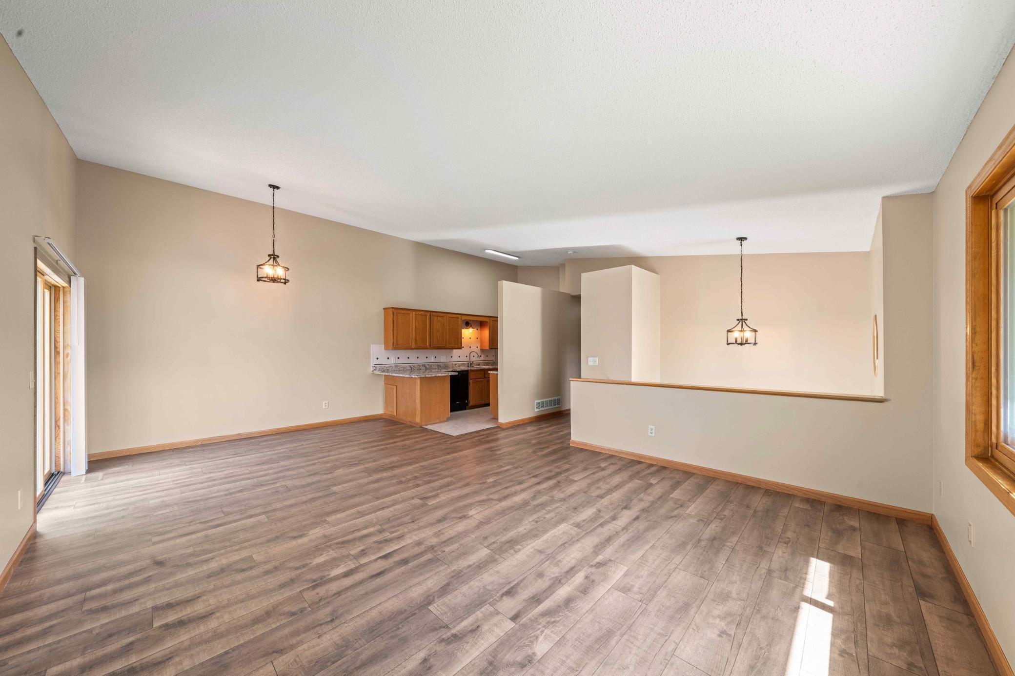 Open layout floor plan with vaulted ceilings