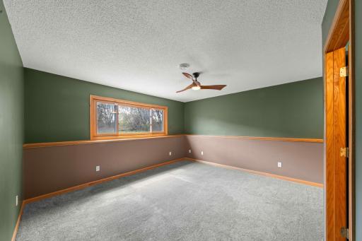 Lower level family room. Great for movie nights to sit back and relax