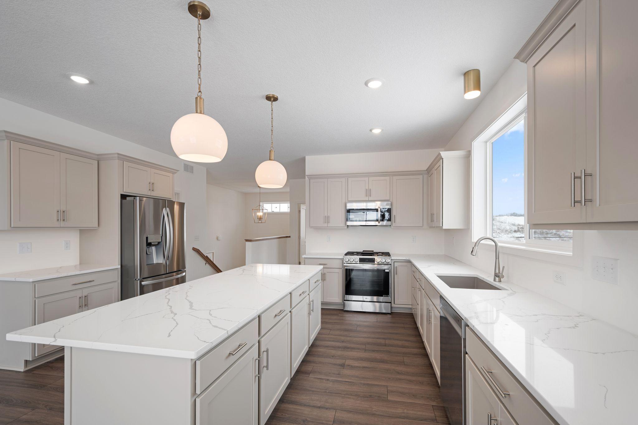 Center island features great prep space