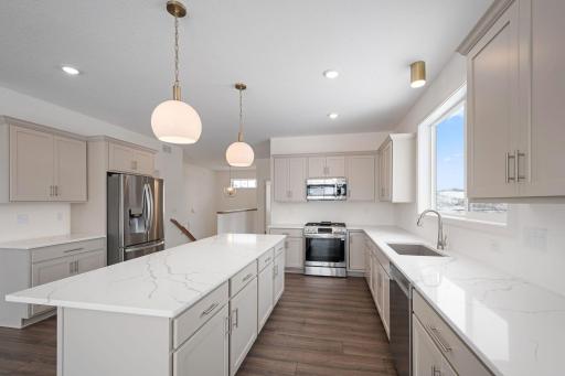 Center island features great prep space