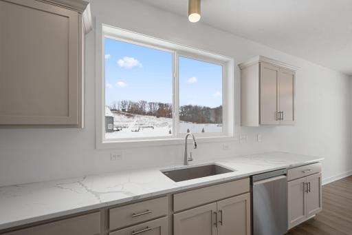 Large window over kitchen sink