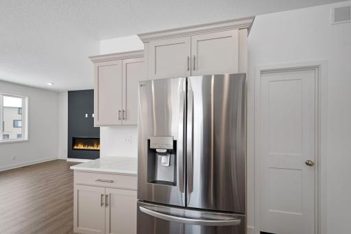 French-door refrigerator next to generously sized walk-in pantry