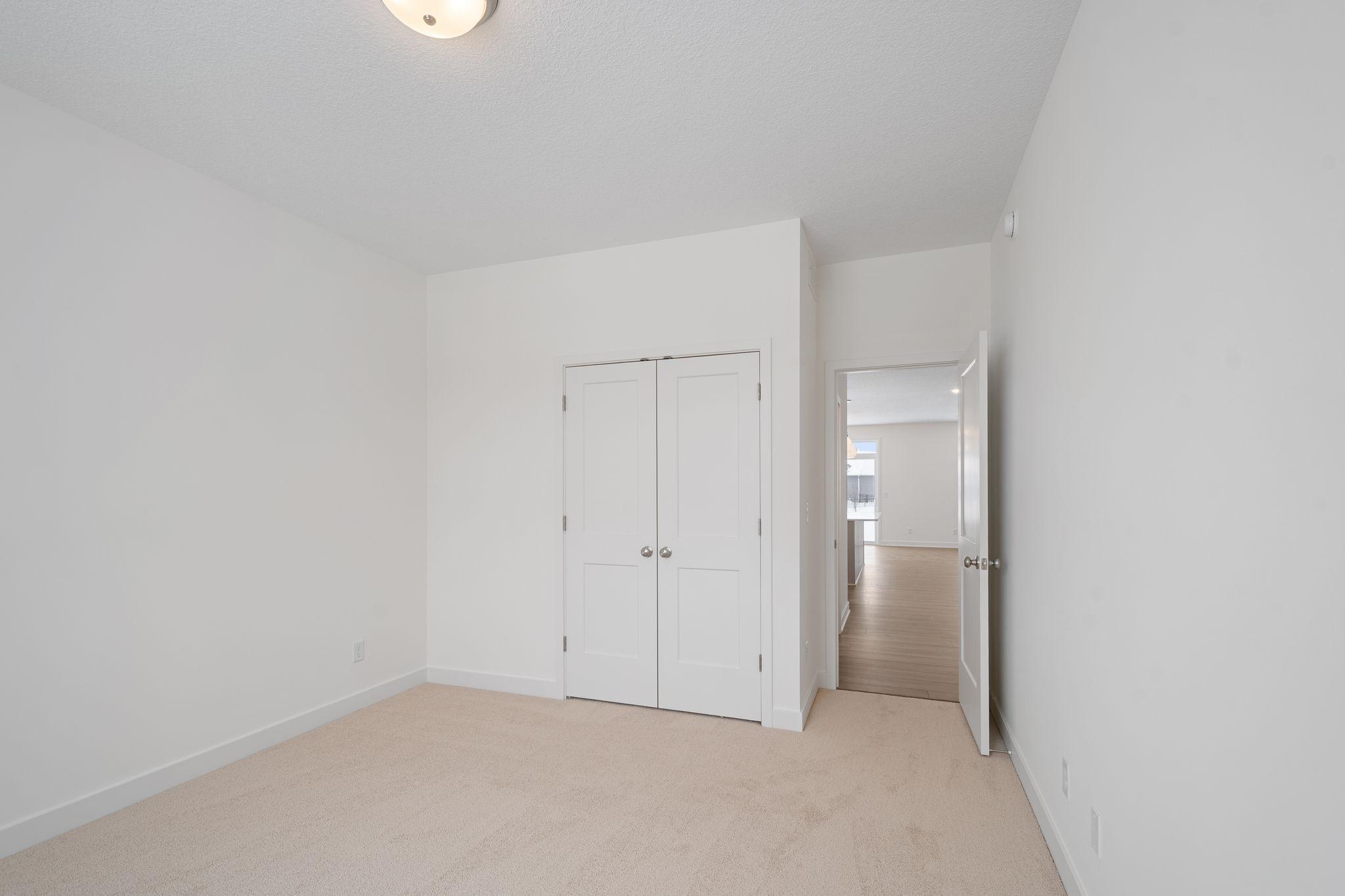 Front bedroom on upper level with tons of natural light