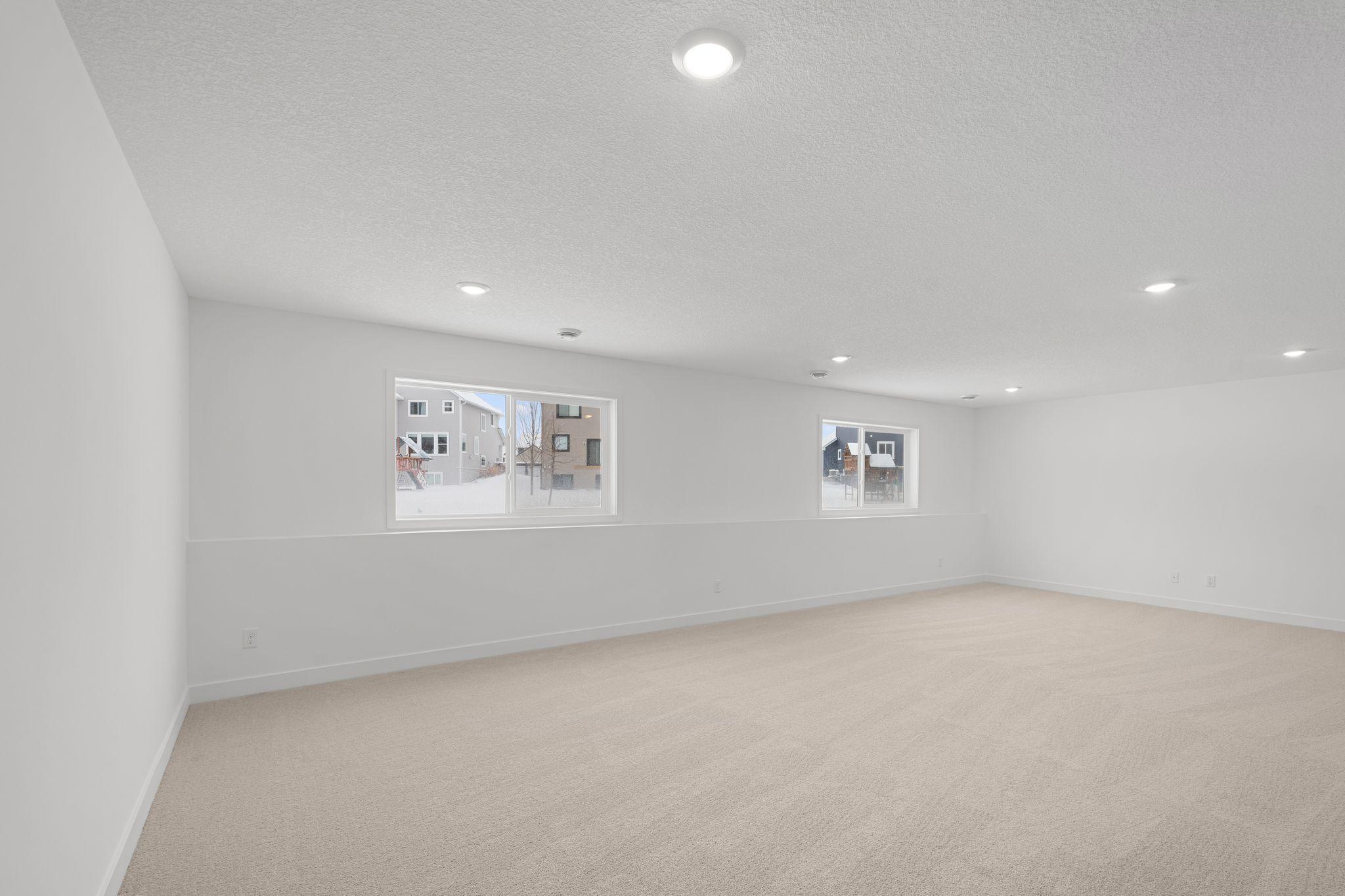 Lower level rec room filled with light