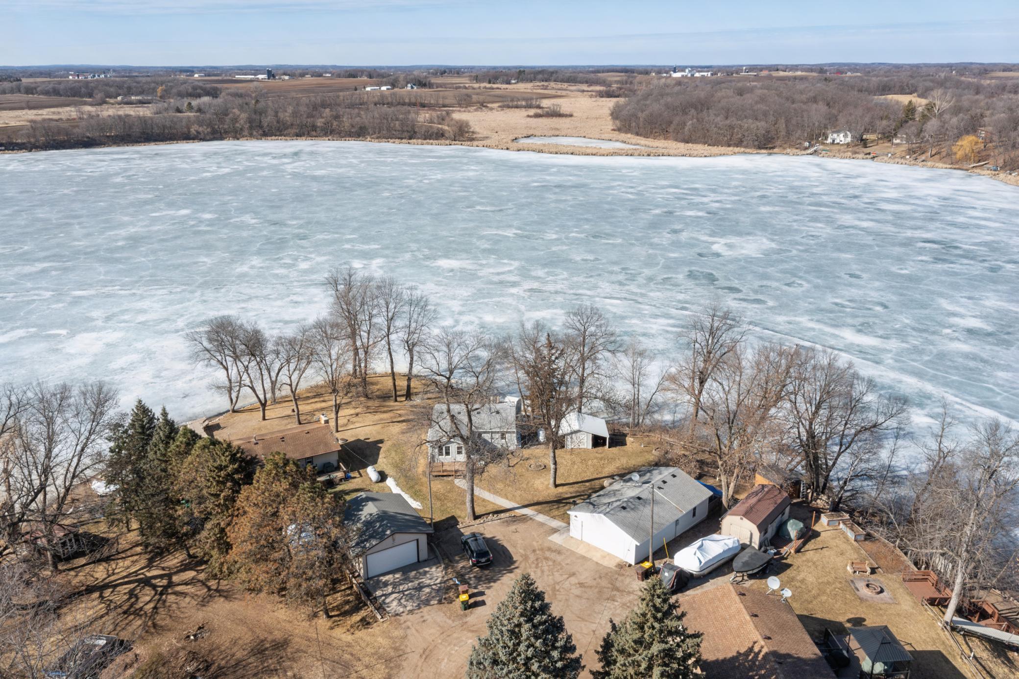 Tucked on a private peninsula on Mink Lake, this property offers the up north feel without the long drive. Take in spectacular sunset views, cast a line on this great fishing lake, and host friends and family.