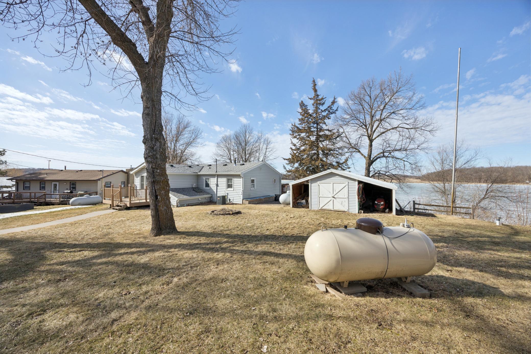 Spacious 233-foot sandy shoreline provides the ultimate lake experience, from sun-soaked play areas to evenings around a bonfire by the water.